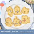 Plastic 3D biscuit mould with cartoon puppy designs including birthday hats and swimming rings