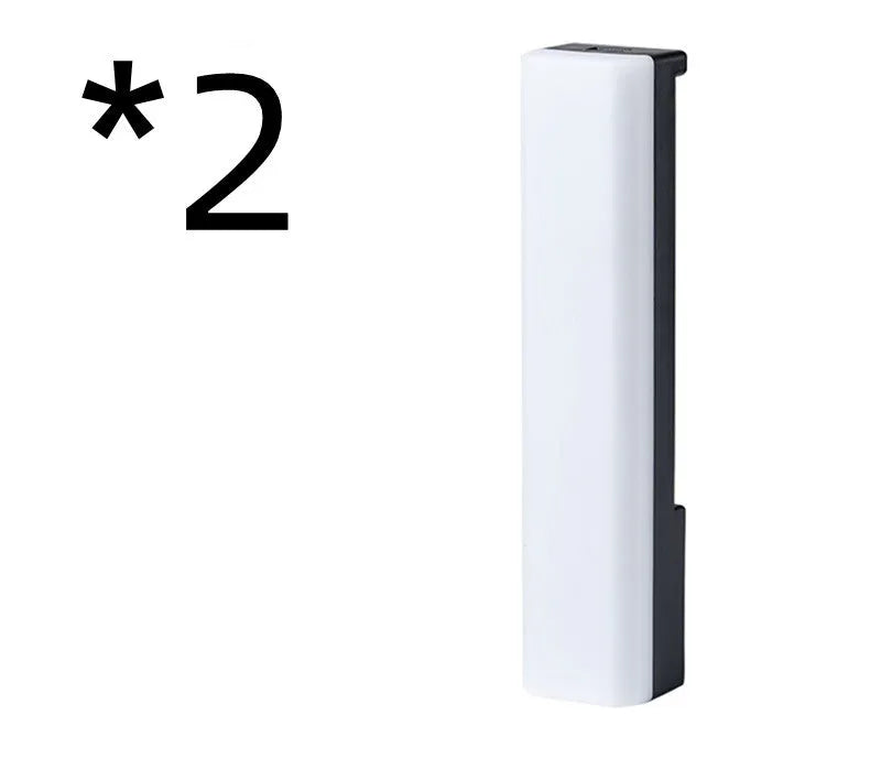 3D RGB music rhythm ambiance lamp in black or white shell on a tabletop.