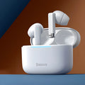 Pearl White and Obsidian Black true wireless earbuds with charging case on a table.