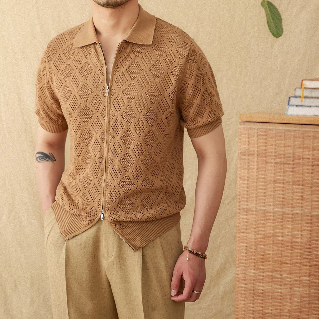 Light brown cotton cardigan with front zipper and short sleeves laid flat.