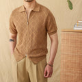 Light brown cotton cardigan with front zipper and short sleeves laid flat.