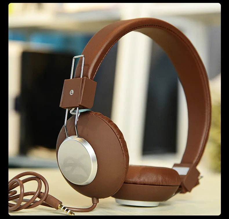 Wired sports earphones with head-mounted design in multiple colour options showing 3.5mm plug