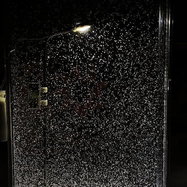 DIY snowy landscape night light kit showing components and assembled desktop decor with LED lights.