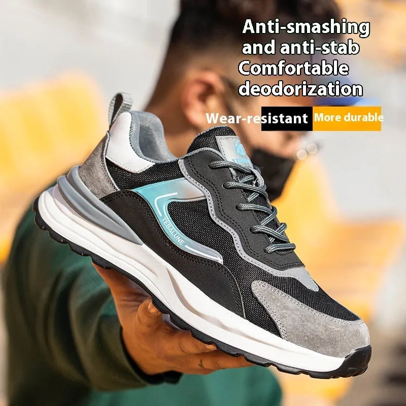 Men's low-top lace-up work safety shoes with suede and mesh upper, steel toe cap, and textured PU outsole.