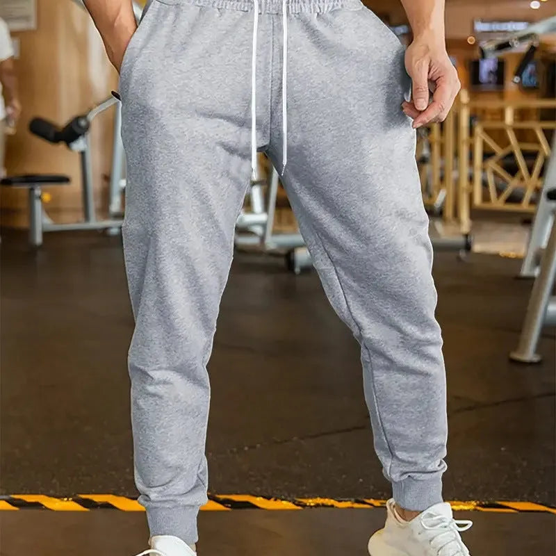 Men's linen-style leisure trousers with elastic lace waist in loose fit