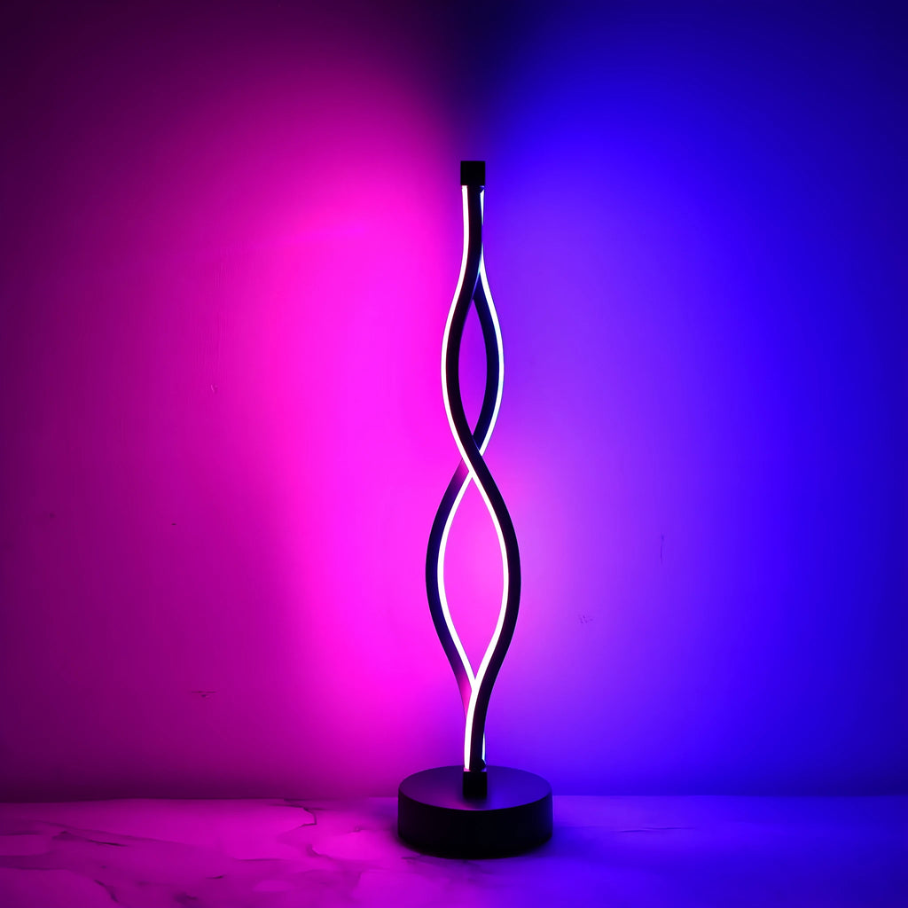 Black aluminium desk lamp with touch and button dimming controls on a desk.