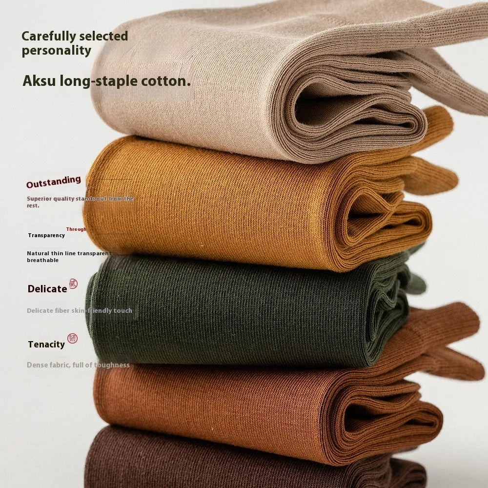 Mid-calf business socks in pure combed cotton showing solid colour options including army green, beige and black