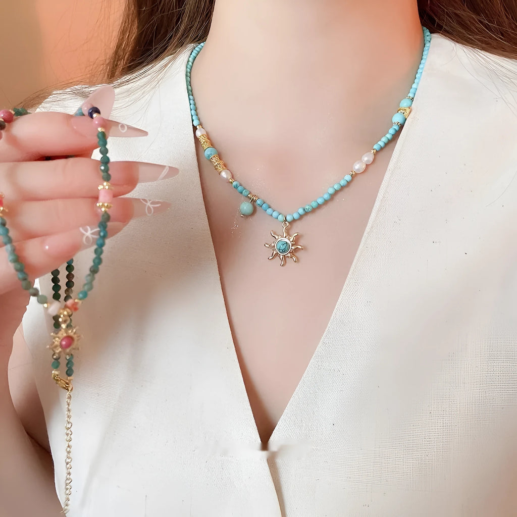 French royal style freshwater pearl necklace with blue sun stone pendant on clavicle chain