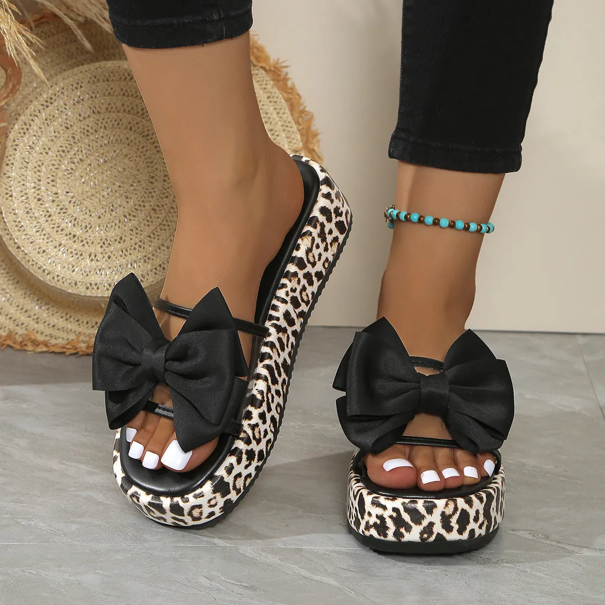 Women's leopard print platform beach slippers with thick sole in black colour