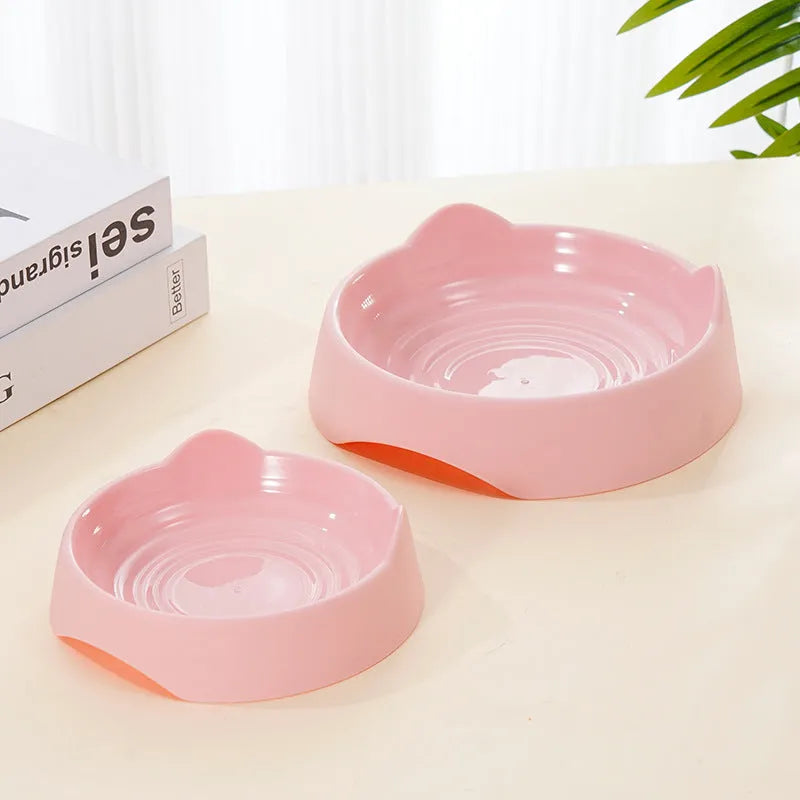 Ceramic dog slow feeder bowl in pink colour showing maze pattern with raised ridges