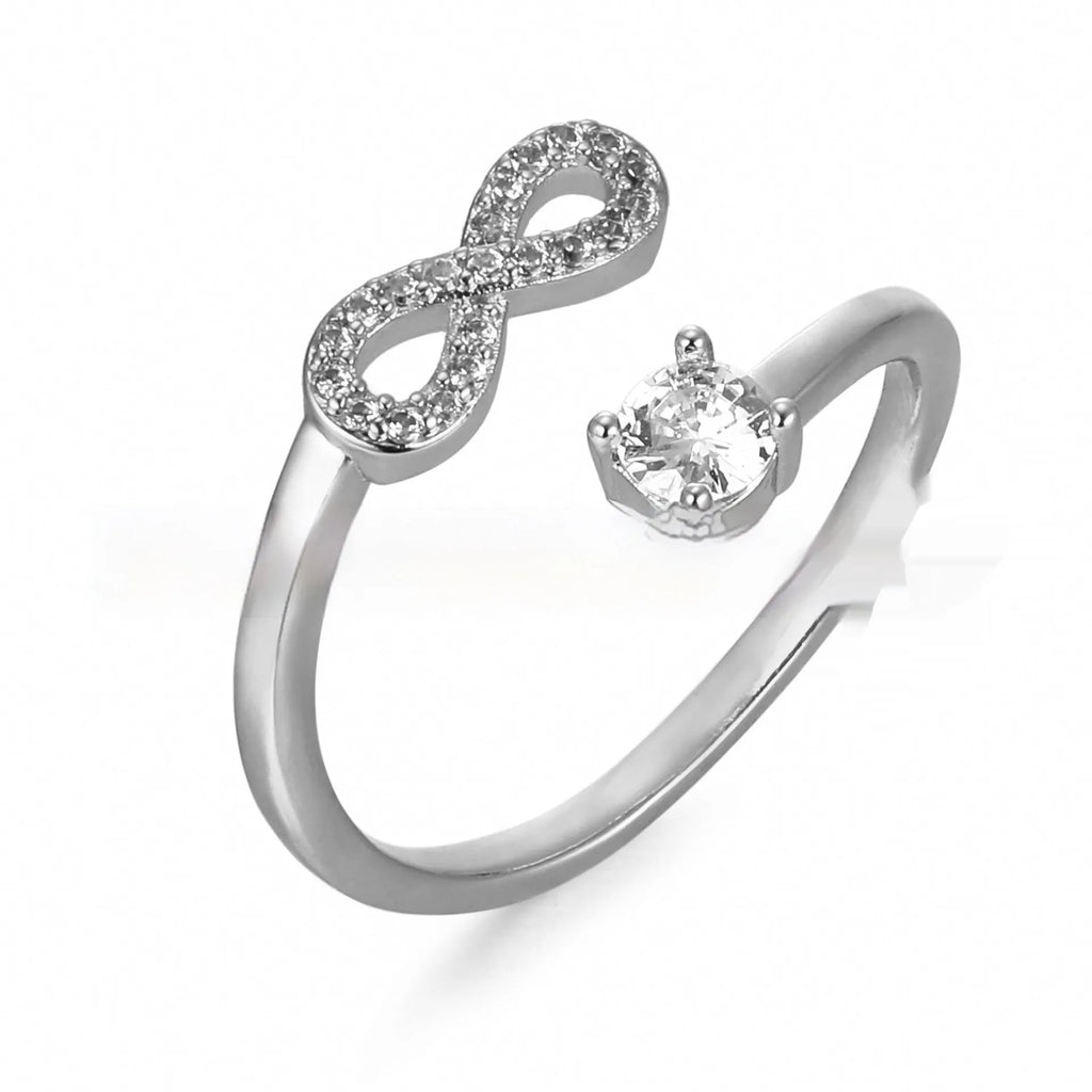 Open band geometric ring with zircon stones showing letter personalisation options A through Z