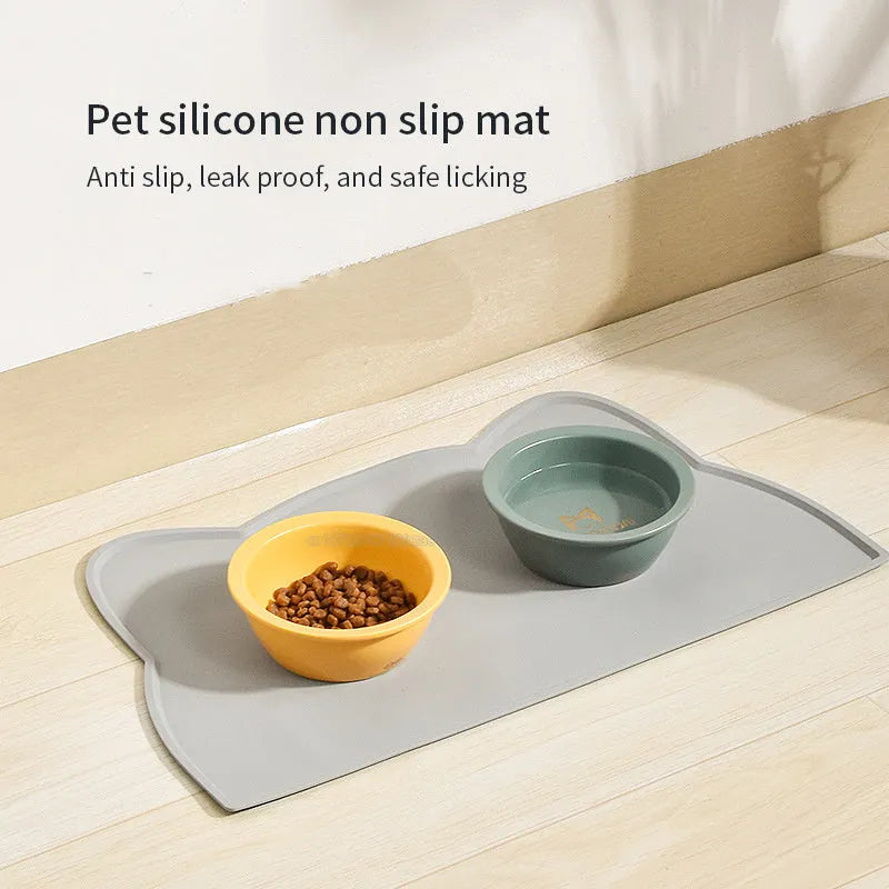 Silicone pet feeding mat with cat head shape design in blue colour for dog and cat bowls
