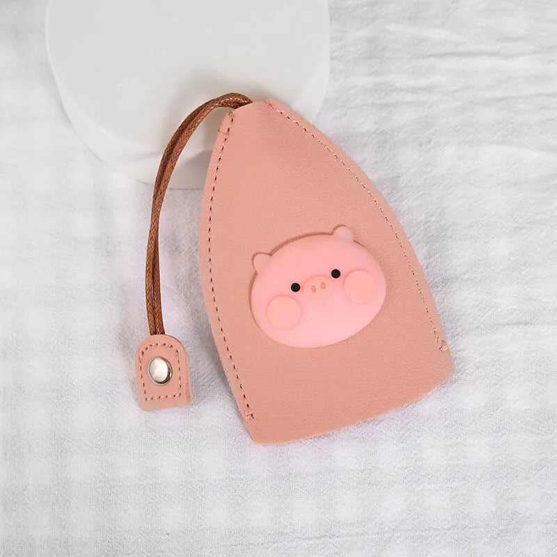 Cartoon PU leather pull-out car key case measuring 14 x 7.5cm with colourful designs