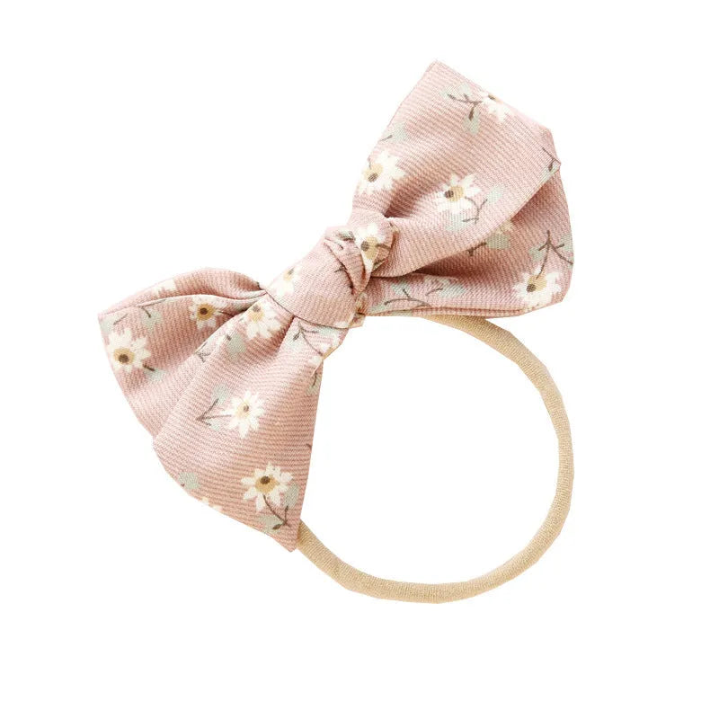 Children's knotted bow hair band in cloth with printed bow detail, Princess series Snow White style, six colours available