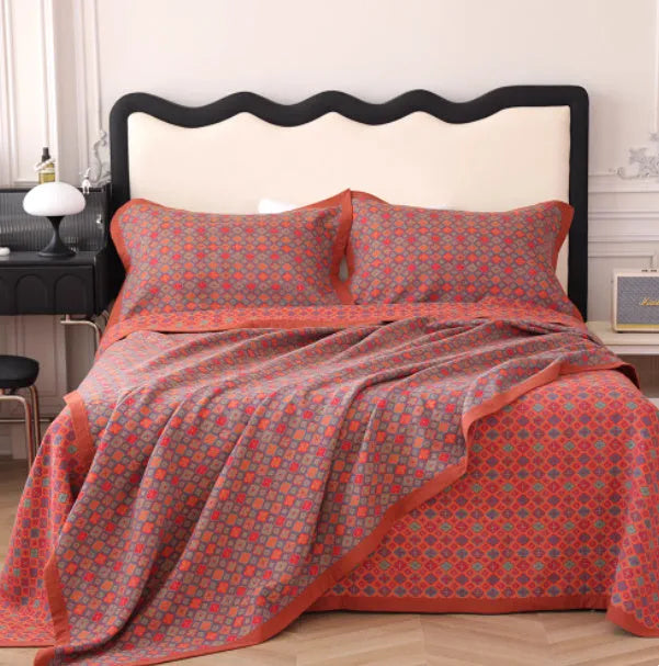 Cotton gauze bed blanket three-piece set with plants and flowers pattern showing blanket and matching pillowcases
