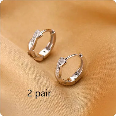 Geometric interwoven hemp rope earrings in gold or silver colour with copper construction