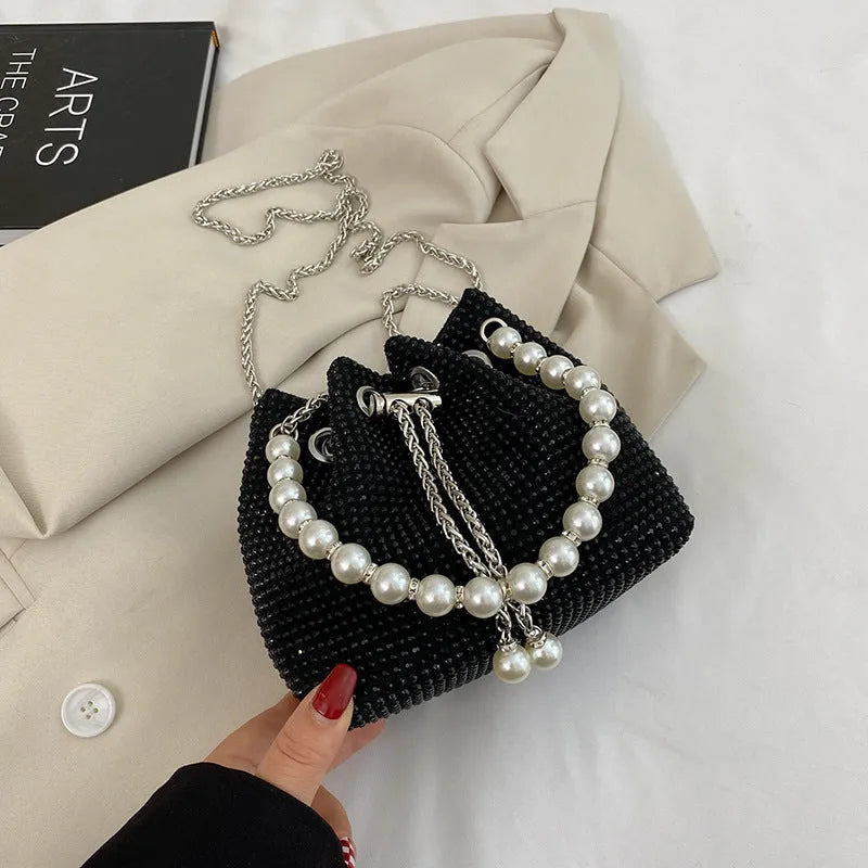 Western style diamond crossbody bag with chain strap in bucket shape design