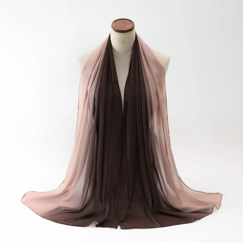 Long light blue chiffon scarf draped showing its 175cm length and 70cm width.