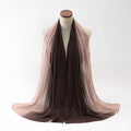 Long light blue chiffon scarf draped showing its 175cm length and 70cm width.