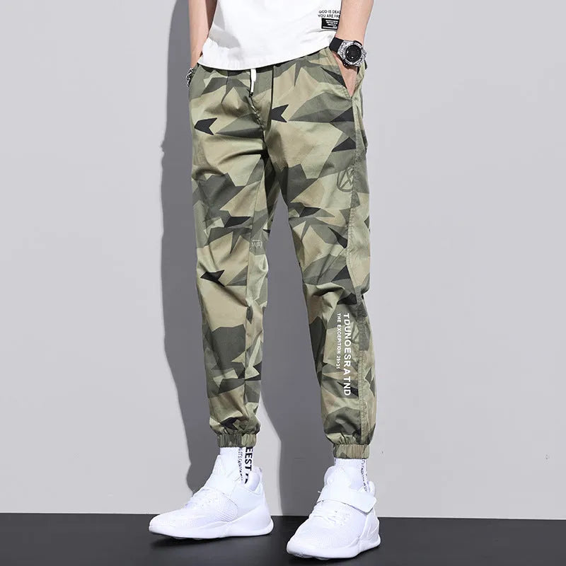 Men's camouflage overalls, straight-leg nine-point casual pants in cotton blend, army green, black or grey, sizes M to 4XL.
