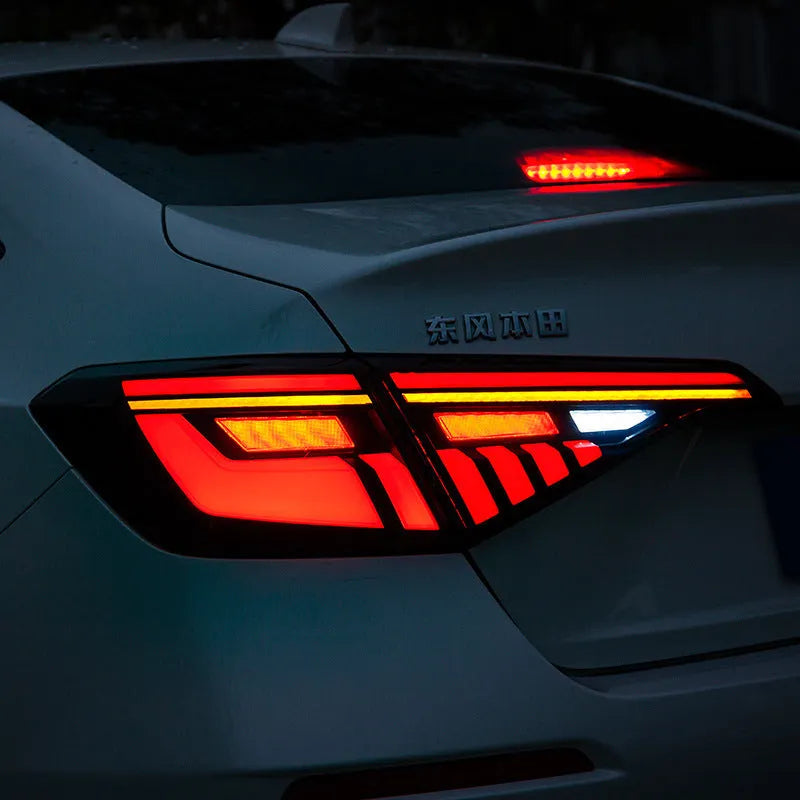 11th generation Honda Civic LED taillight assembly set showing black and red colour option with integrated lighting functions