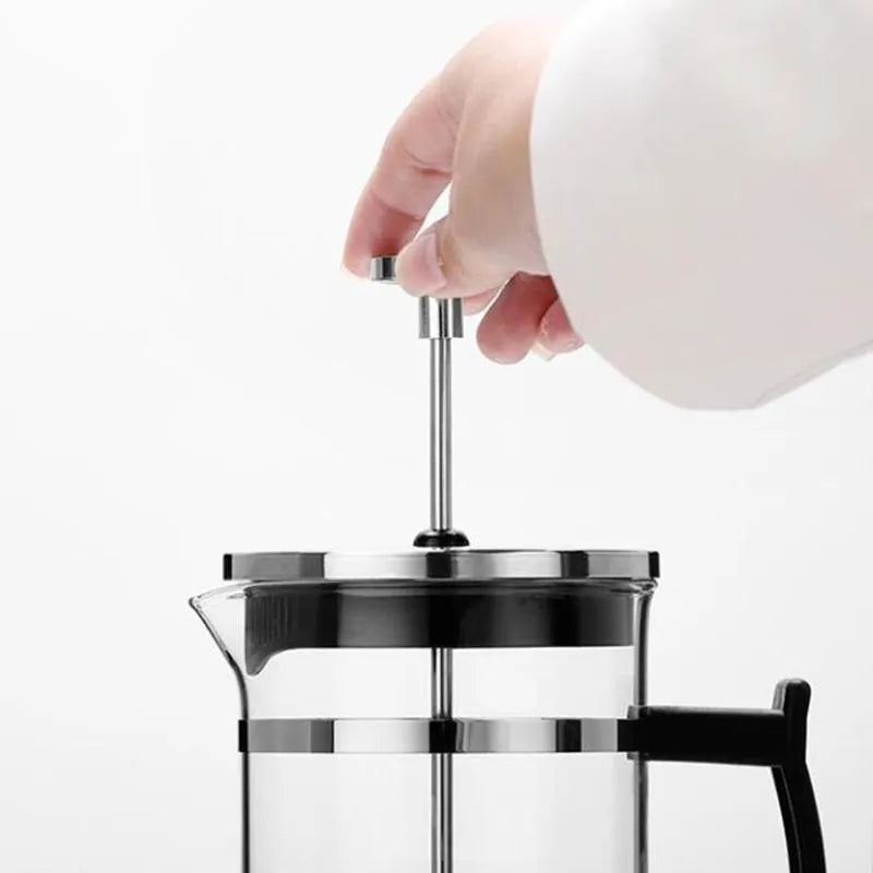 Glass manual coffee maker with stainless steel filter, 350ml capacity, dimensions 10cm by 8cm by 17cm.