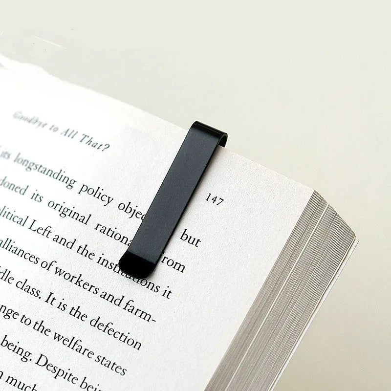 15cm retractable aluminium bookmark ruler with laser-engraved scale in black or silver