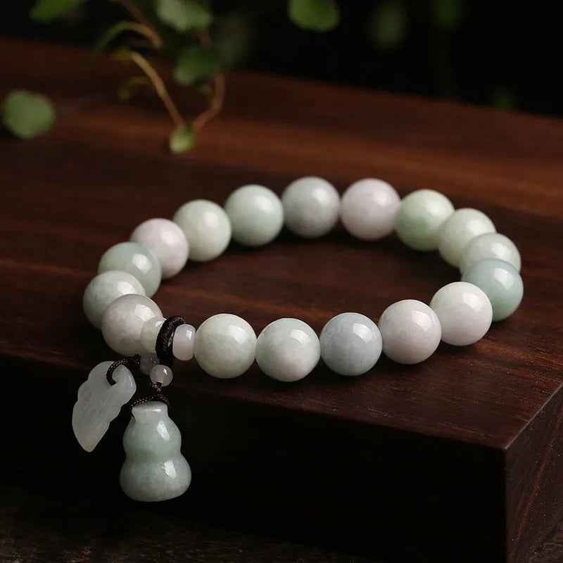 Natural emerald jade bracelet with geometric beads and Maitreya Buddha hanging pendant