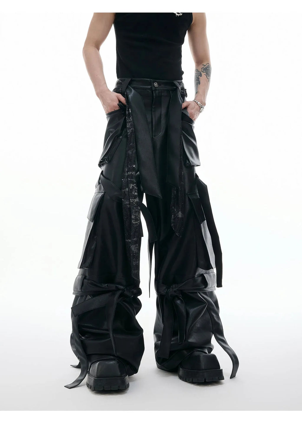 Black loose-fit quilted trousers with multiple pockets and stitching detail