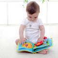 Multi-functional soft cloth baby book with zip and carry handle, 18.5cm wide by 20cm high, 12 pages.