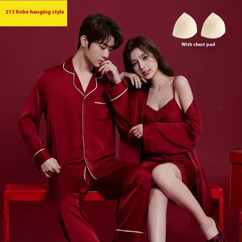 Red matching men's and women's silk sleepwear set with long sleeves and trousers.