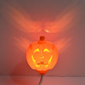 Plastic pumpkin lamp with yellow or purple light option, USB charging, 8.3cm wide by 22cm tall