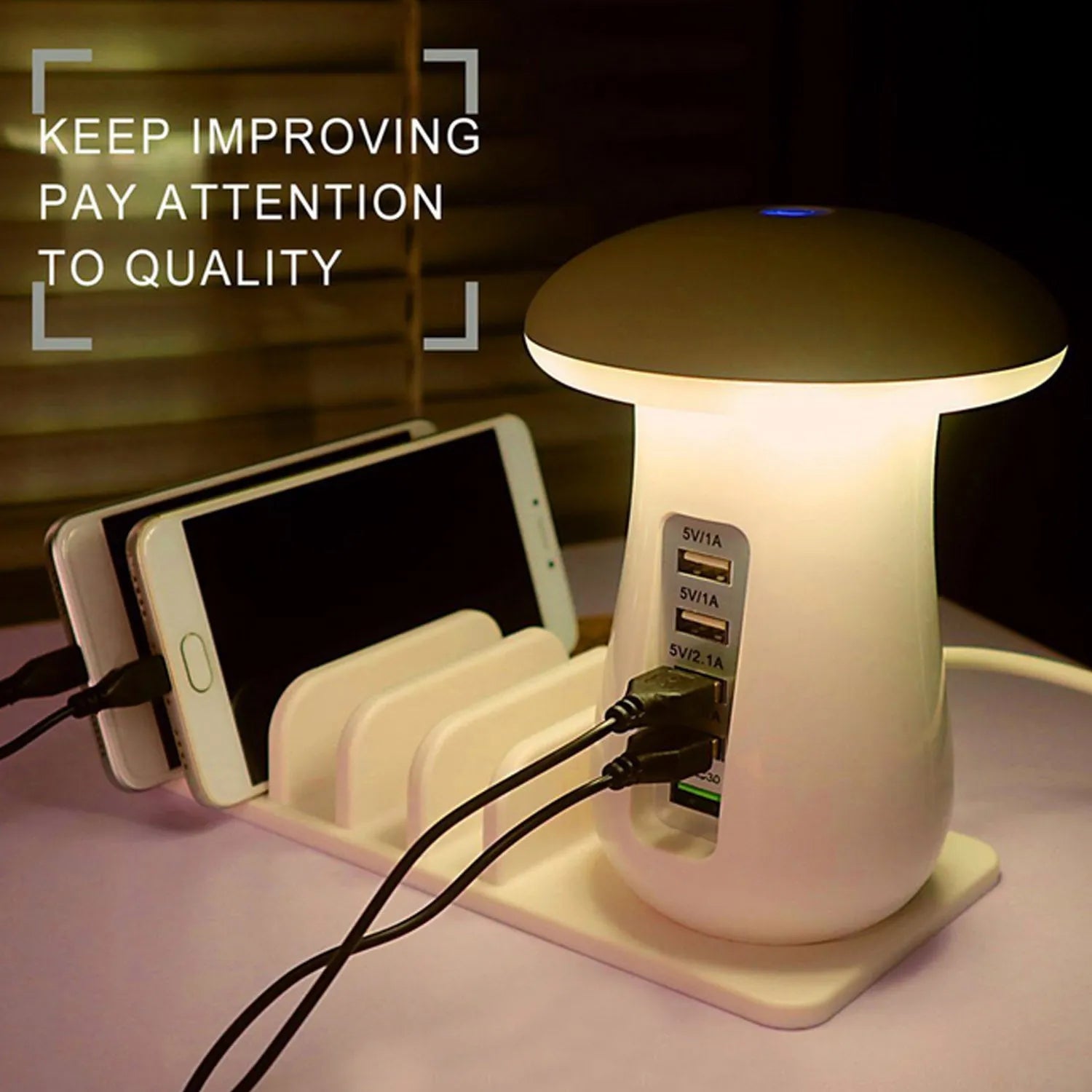 White USB charging station with five ports and built-in LED night light on wooden desk