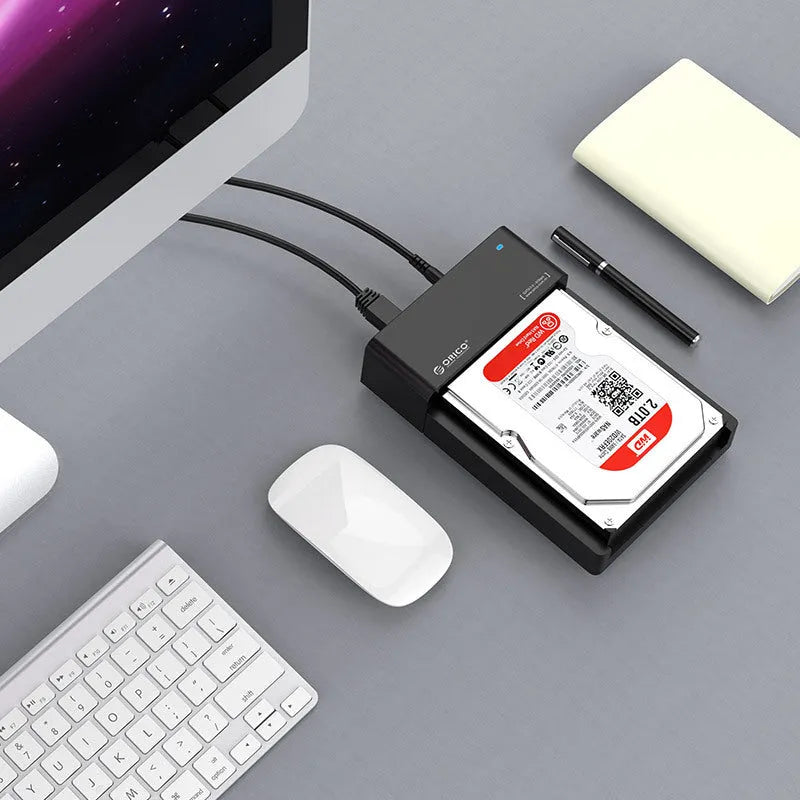 Black plastic 2.5-inch SATA hard drive enclosure with USB cable for external storage conversion