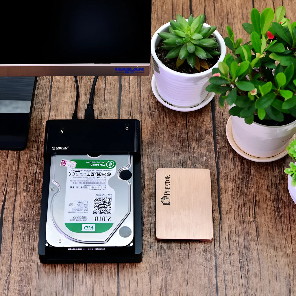 Black plastic 2.5-inch SATA hard drive enclosure with USB cable for external storage conversion