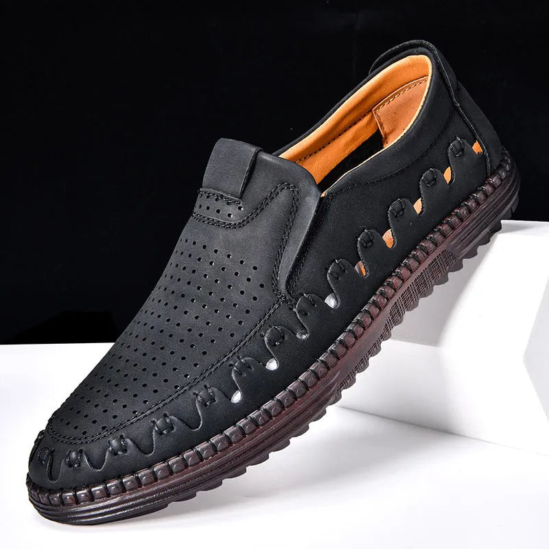 Men's brown casual slip-on leather shoes with round toe and flat sole on a white background.