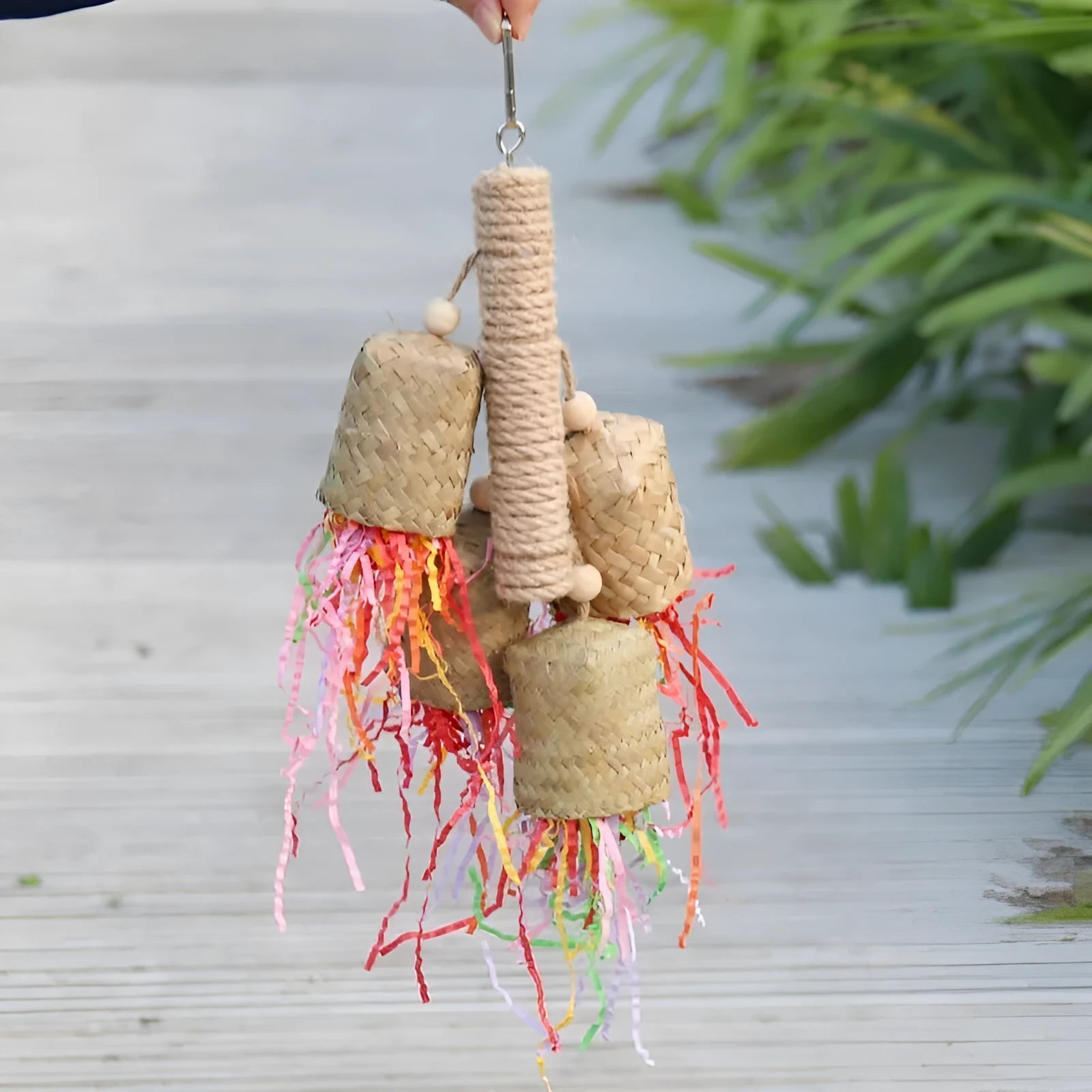 Wood and sisal rope shredded paper bird toy for parrots measuring 15cm by 35cm