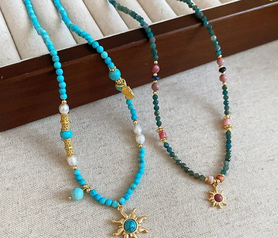 French royal style freshwater pearl necklace with blue sun stone pendant on clavicle chain