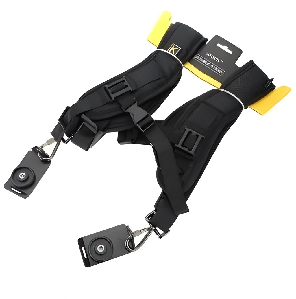 Black nylon dual SLR camera strap with thick sponge shoulder pads, shown carrying two cameras.
