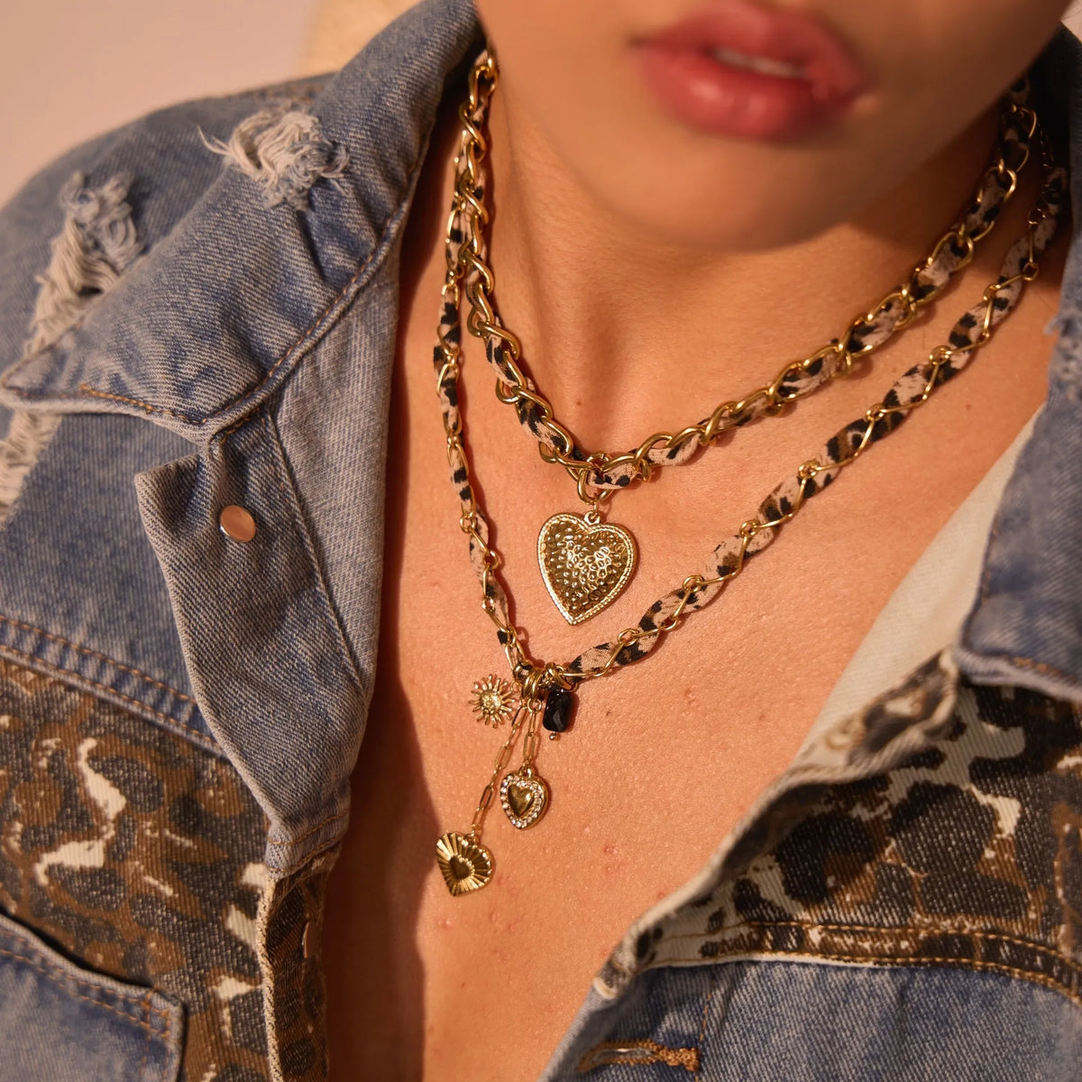Geometric leopard love pendant stainless steel necklace with gold electroplated finish on adjustable chain