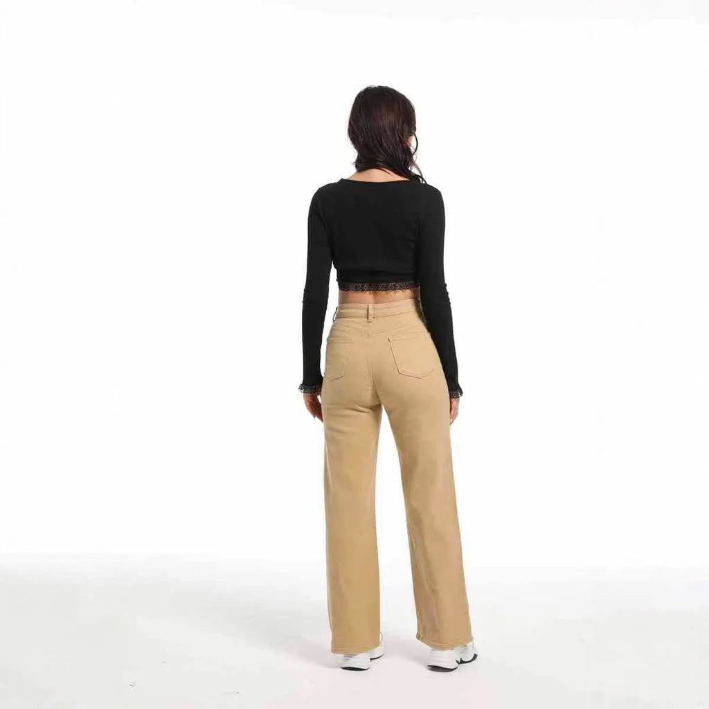 Women's apricot wide leg high waist jeans with straight cut on a hanger
