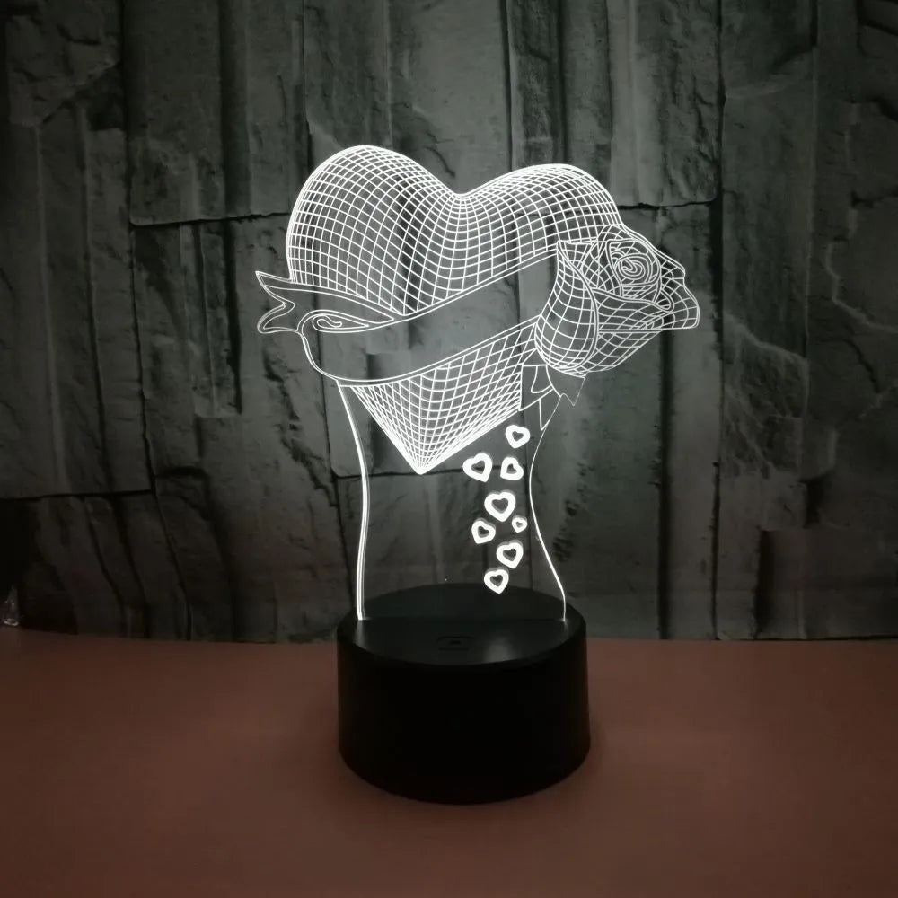 3D night light with acrylic board and black ABS base, showing seven colours and USB cable