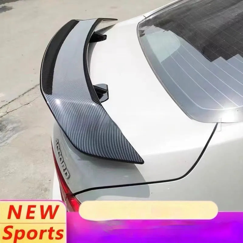 Universal car punch-free tail wing spoiler in ABS plastic on a vehicle