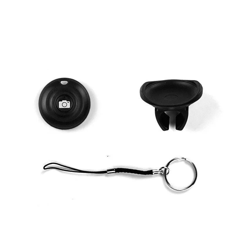 Black Bluetooth remote selfie shutter for smartphone photography with wireless operation
