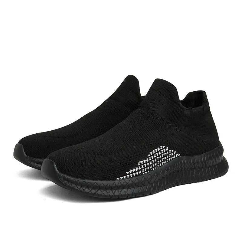 Popcorn Flyknit low-top fabric sneaker in solid colour with round toe and flat sole