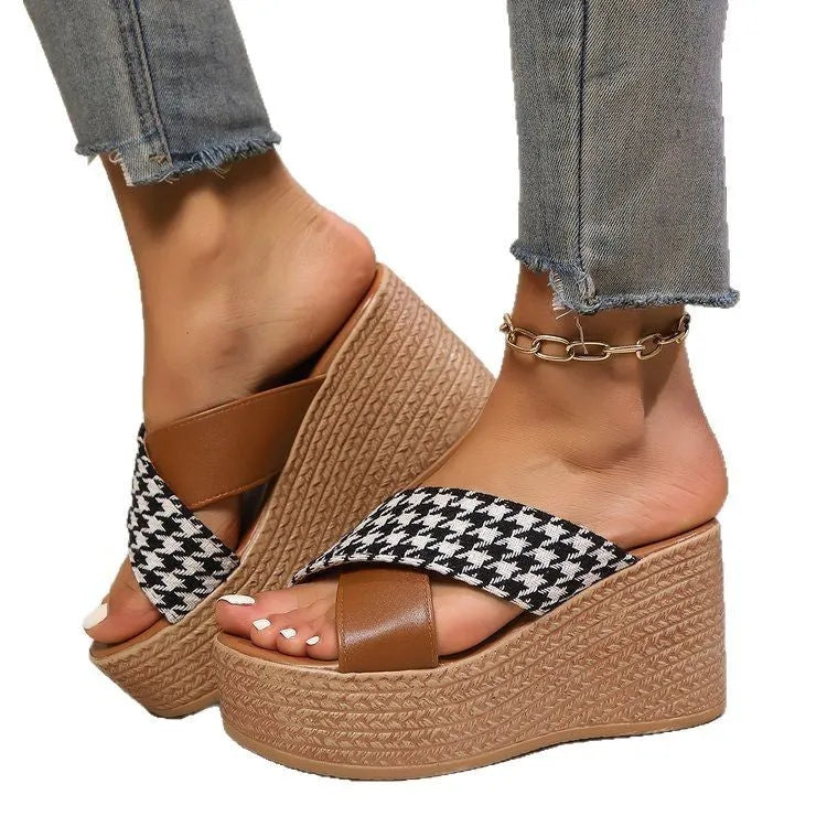 Brown plaid wedge sandals with cross leopard print and a black rubber sticky sole.
