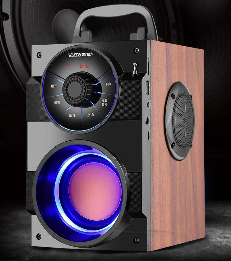 Black portable audio system with subwoofer, USB cable, and 3.5mm audio connection cable