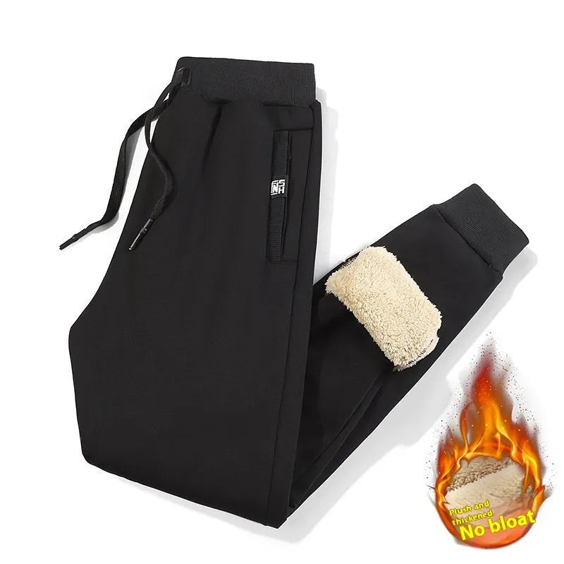 Men's grey fleece-lined cotton track pants with drawstring waistband in oversized fit