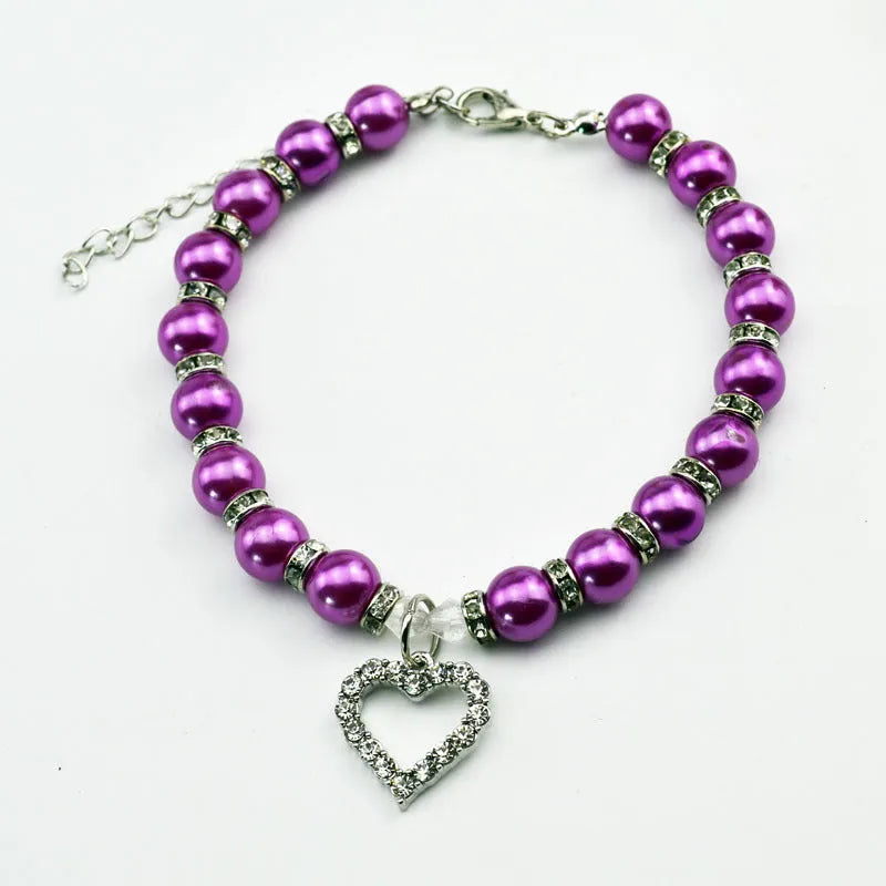 Pet pearl necklace with 10mm imitation pearls, 7mm rhinestone beads, alloy pendant, and white plated K detail