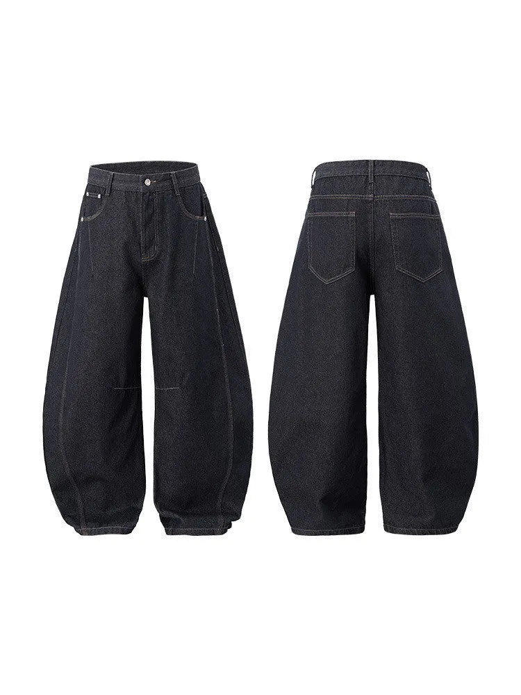Men's wide-leg denim trousers in original cow colour, showing relaxed fit and mid-waist design.